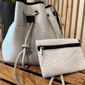 Neoprene drawstring crossbody purse